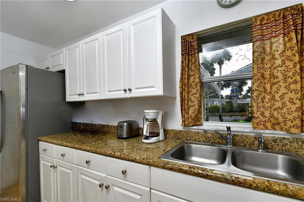 2 E Greens CIR, LEHIGH ACRES FL 33936-16