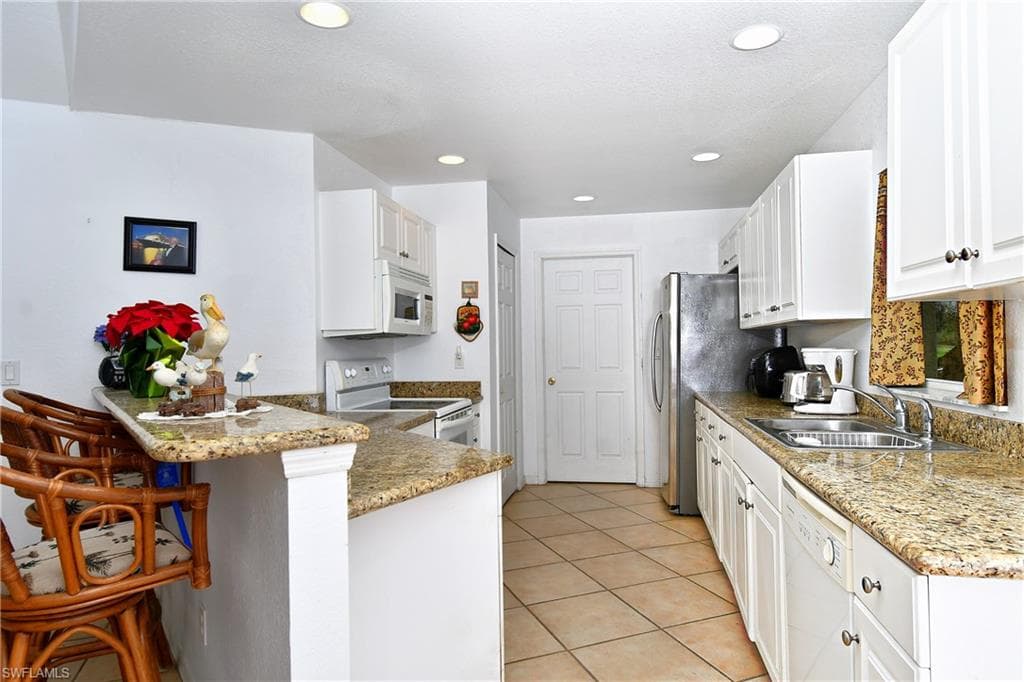 2 E Greens CIR, LEHIGH ACRES FL 33936-14