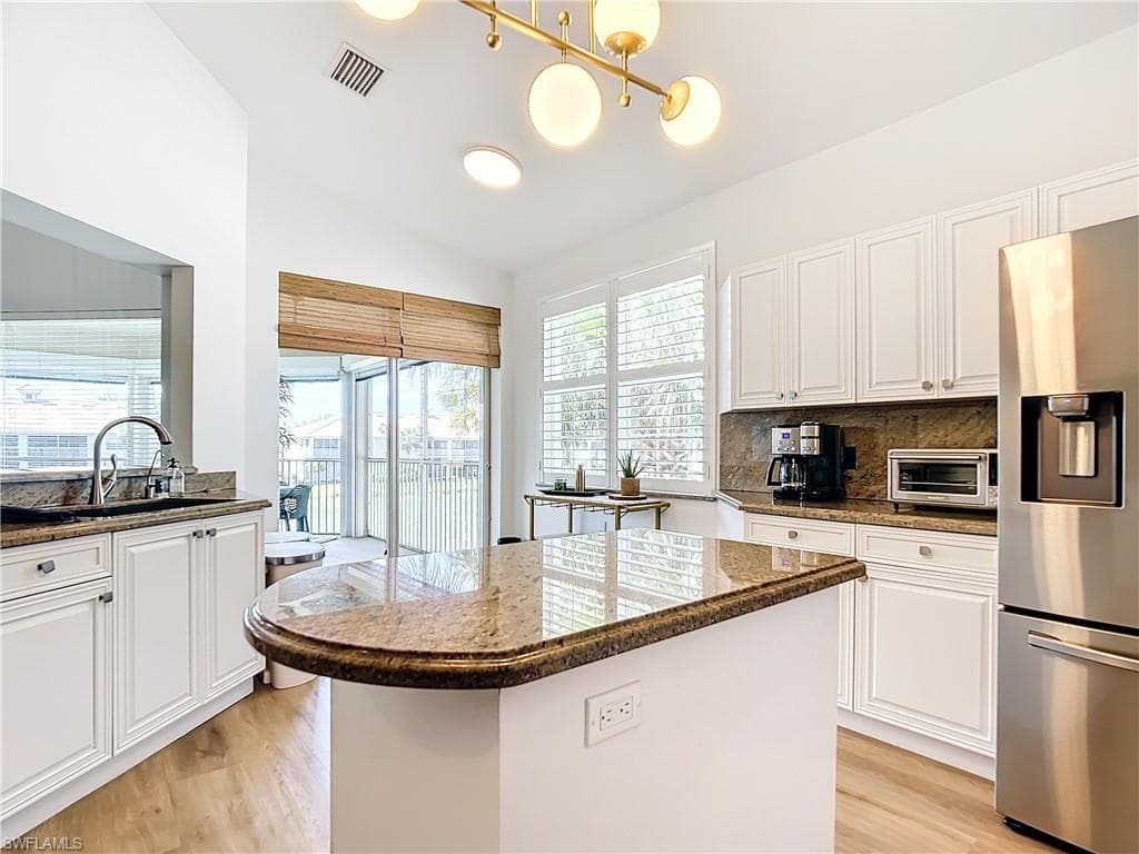 3077 Windsong CT # 704, NAPLES FL 34109-15