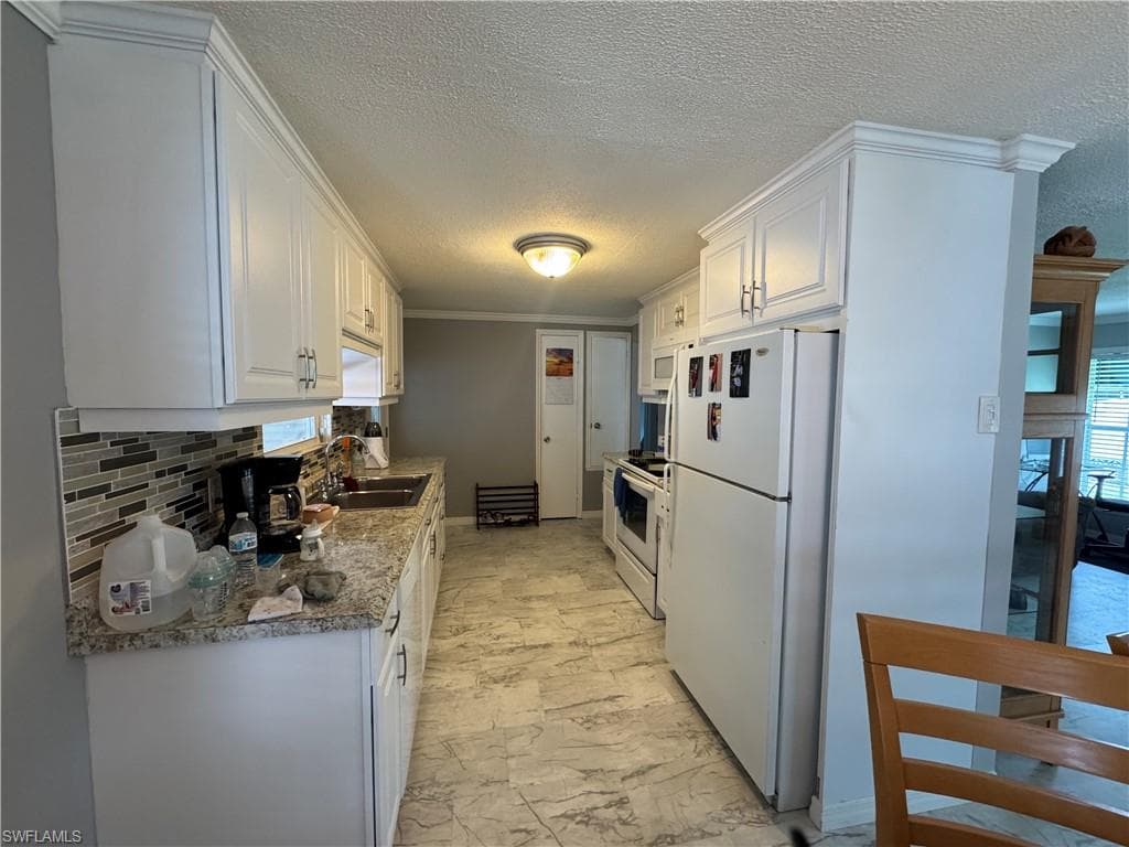 84 Enchanting BLVD, NAPLES FL 34112-17