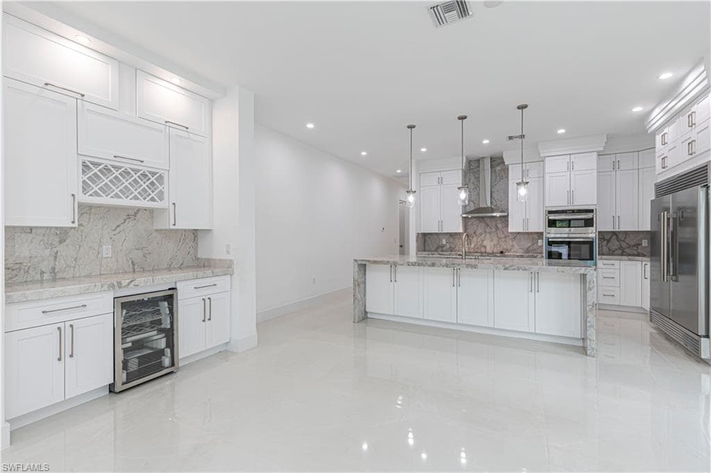 3074 Pine Tree DR, NAPLES FL 34112-5