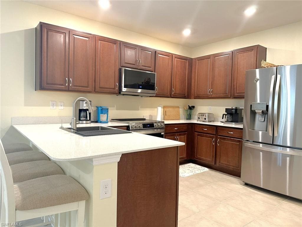 20031 Fiddlewood AVE, NORTH FORT MYERS FL 33917-2