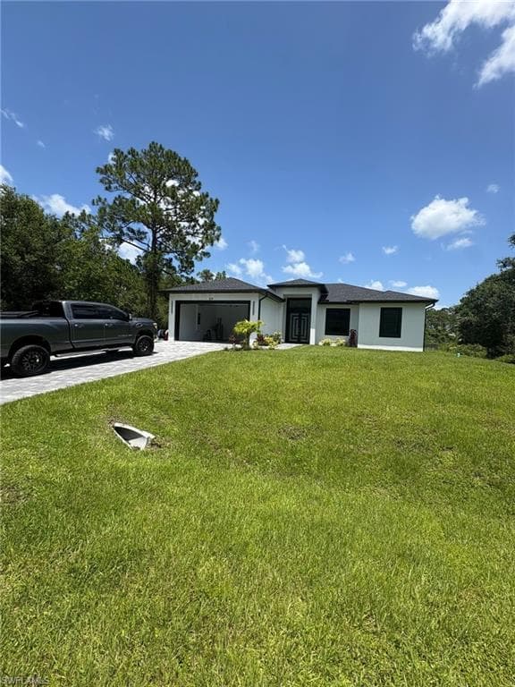 219 Malden AVE S, LEHIGH ACRES FL 33974-2