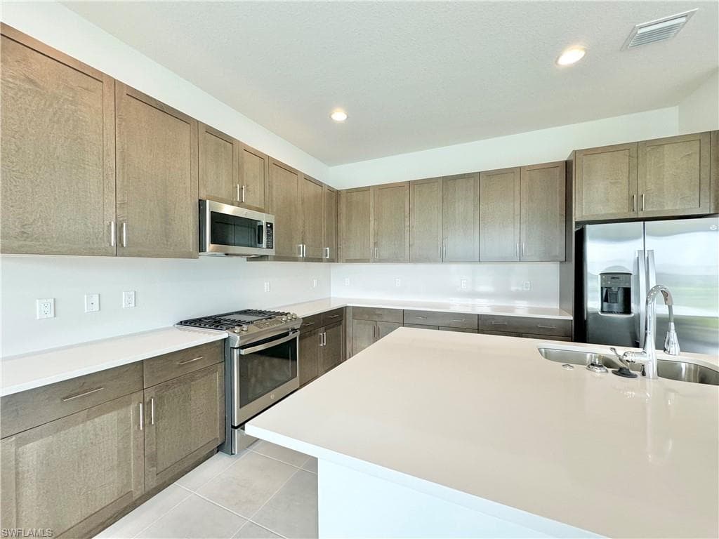 20921 Thistle Leaf LN, ESTERO FL 33928-11