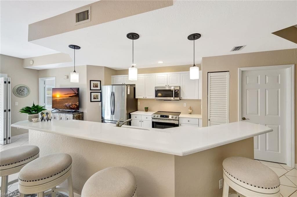 28631 CARRIAGE HOME DR # 103, BONITA SPRINGS FL 34134-11
