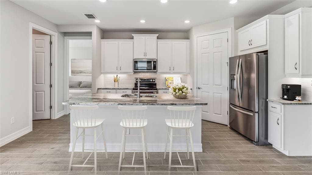 531 SPRING HILL LAKE LOOP, CAPE CORAL FL 33993-4