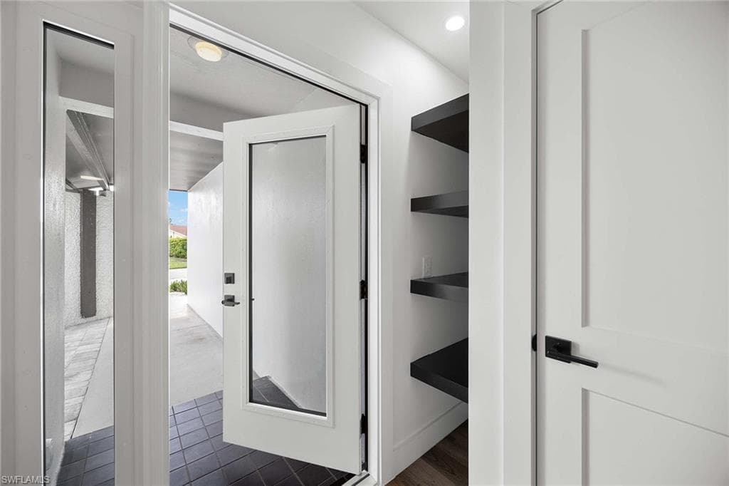 1235 Woodridge AVE, NAPLES FL 34103-7