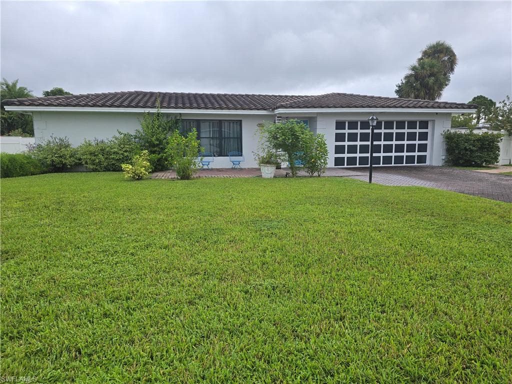 211 Richmond AVE S, LEHIGH ACRES FL 33936-1