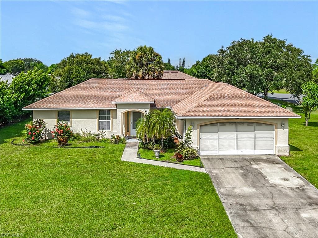 402 Chancery AVE, LEHIGH ACRES FL 33936-1