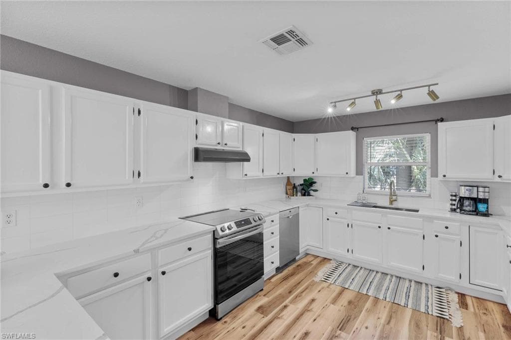 428 Sharwood DR, NAPLES FL 34110-12