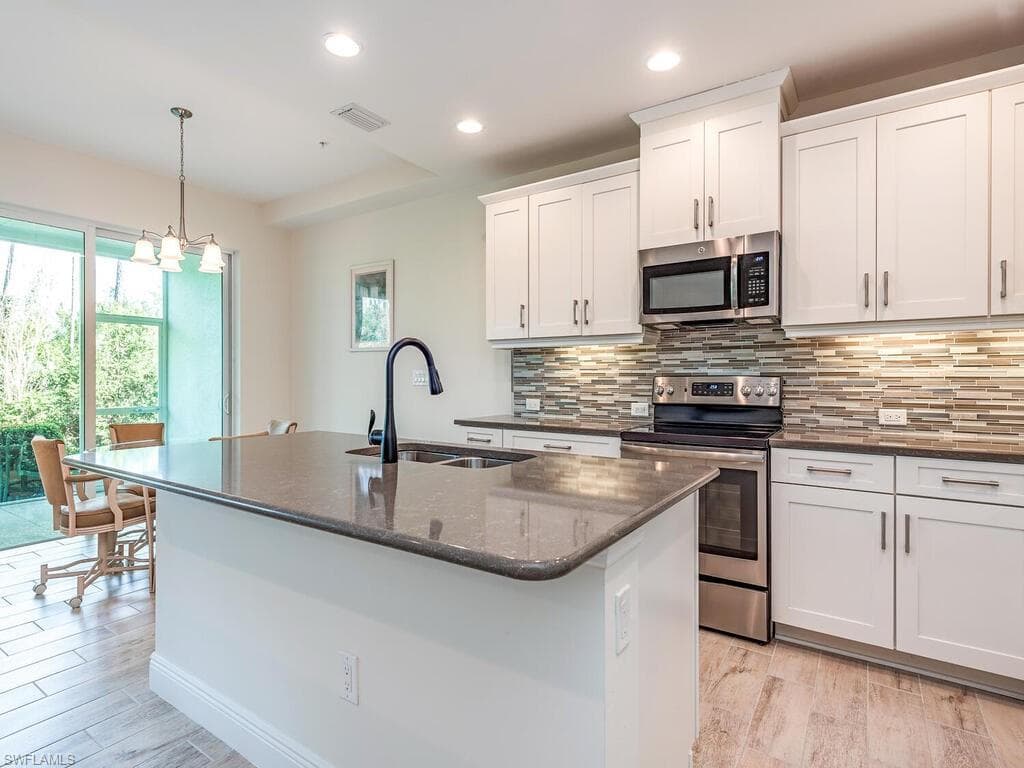 6981 Avalon CIR 1203-4