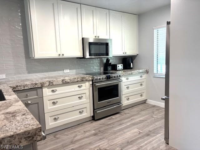 5656 Woodmere Lake CIR C204-2