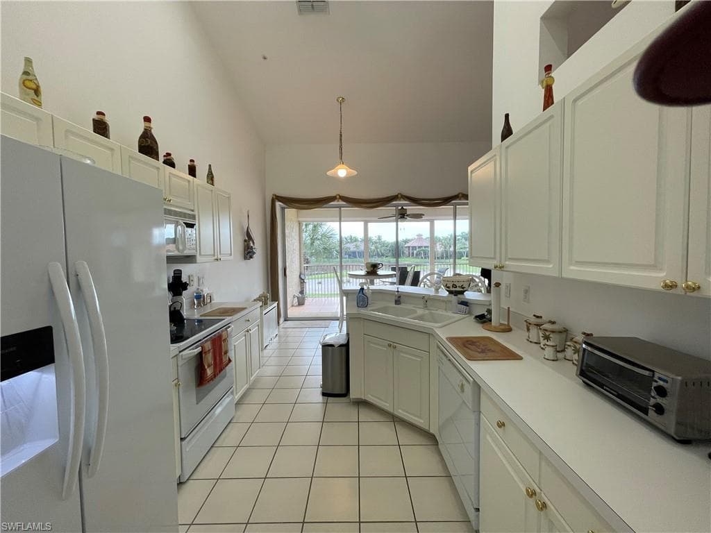 25232 Pelican Creek CIR # 202, BONITA SPRINGS FL 34134-5