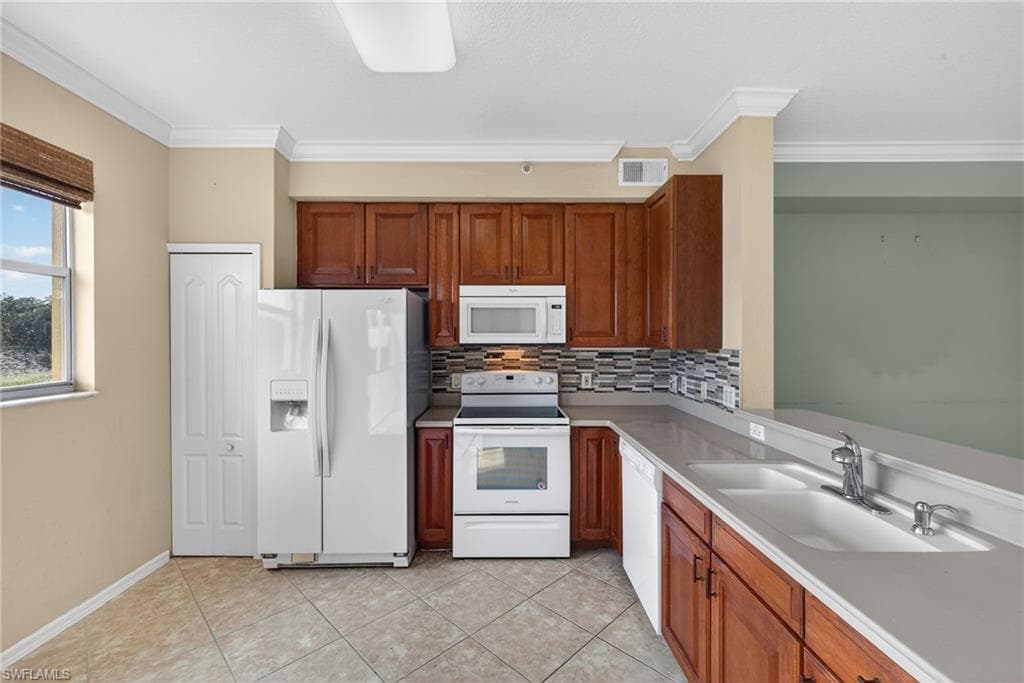 6816 STERLING GREENS PL # 303, NAPLES FL 34104-3