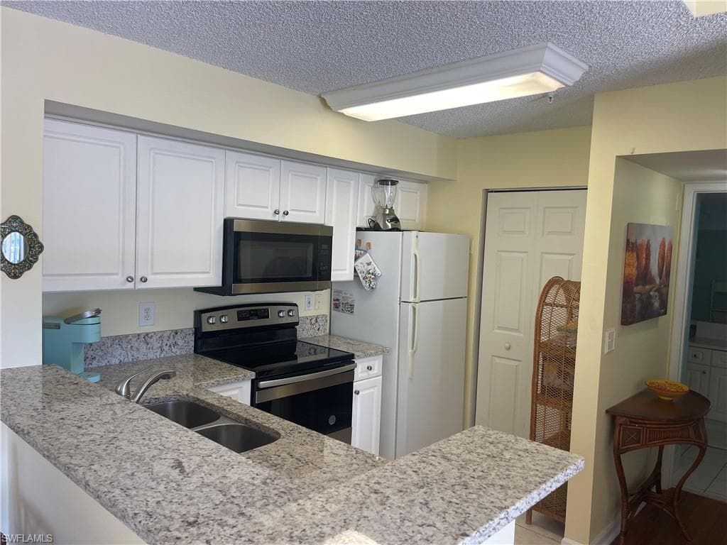 1260 Wildwood Lakes BLVD # 201, NAPLES FL 34104-4