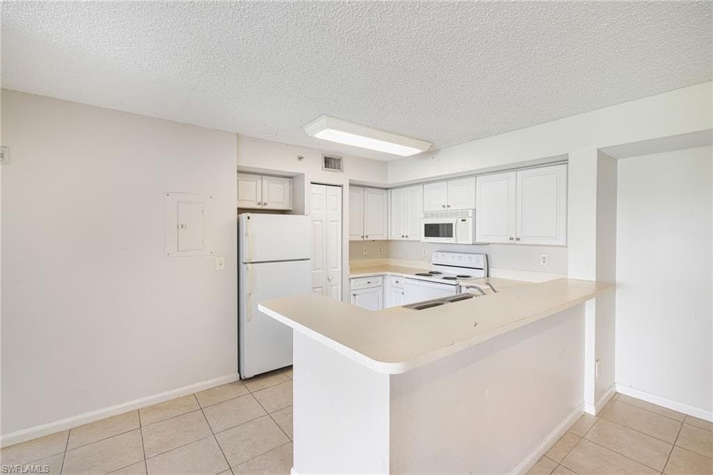 1265 Wildwood Lakes BLVD # 106, NAPLES FL 34104-8