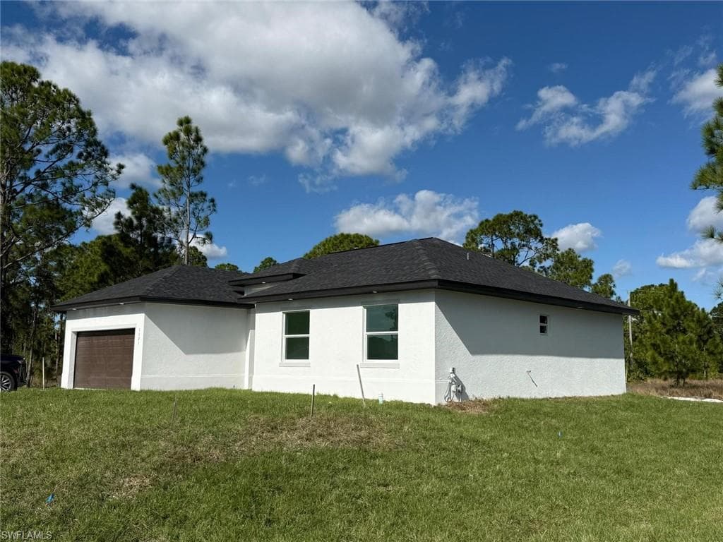 1121 Florence ST E, LEHIGH ACRES FL 33974-2