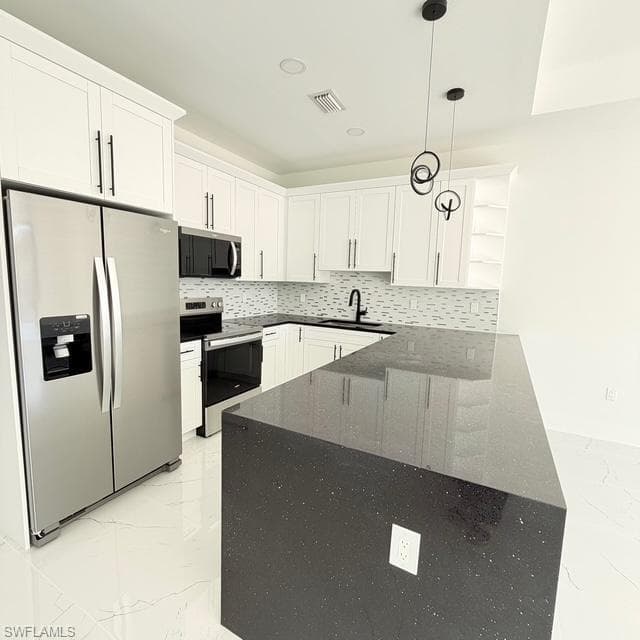 213-215 W 12th ST, LEHIGH ACRES FL 33972-7