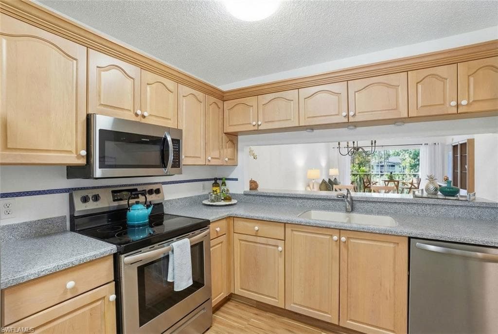 5654 WOODMERE LAKE CIR # C203, NAPLES FL 34112-8