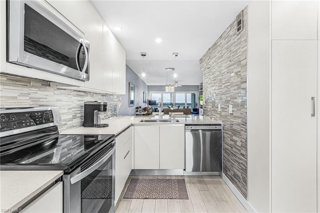 8402 Estero BLVD 704-4